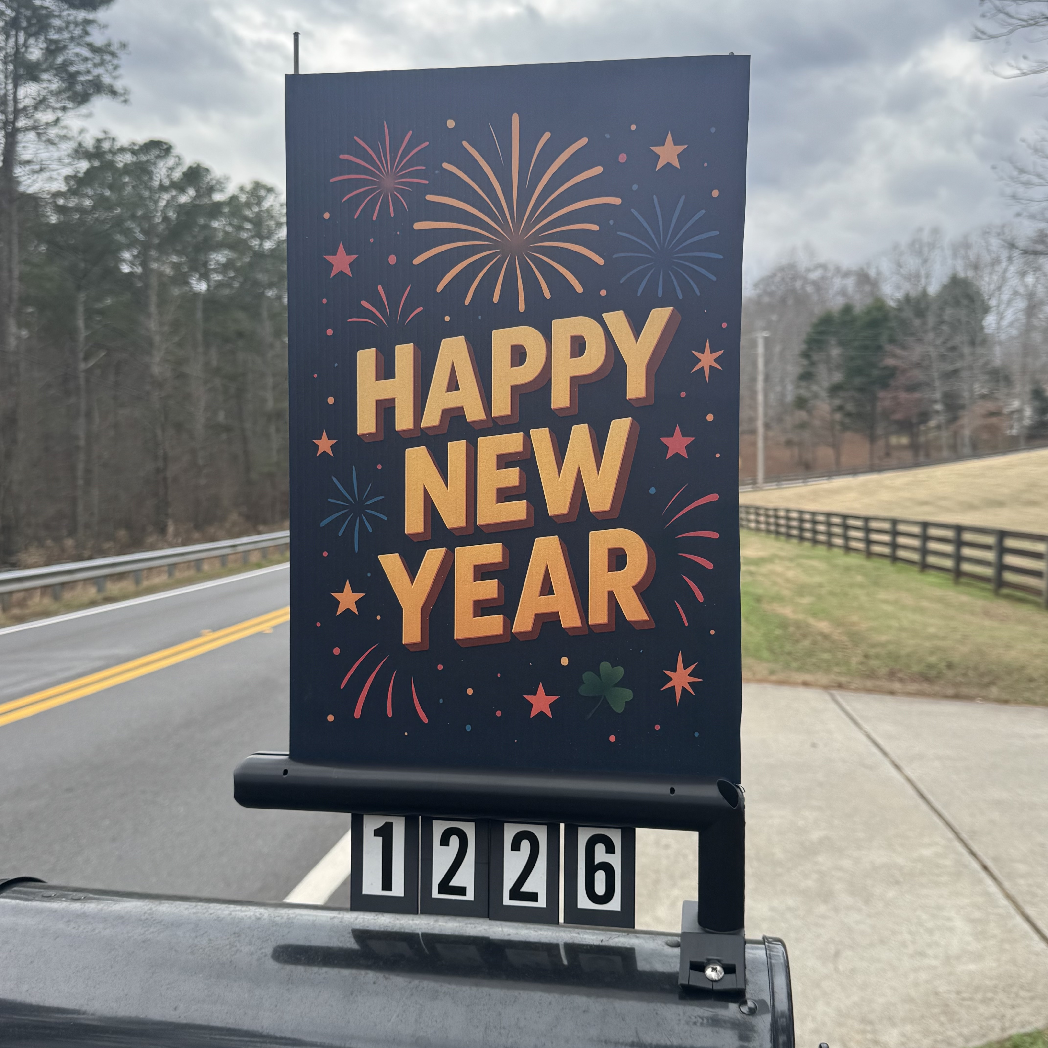 MailboxFan with Happy New Year sign on mailbox